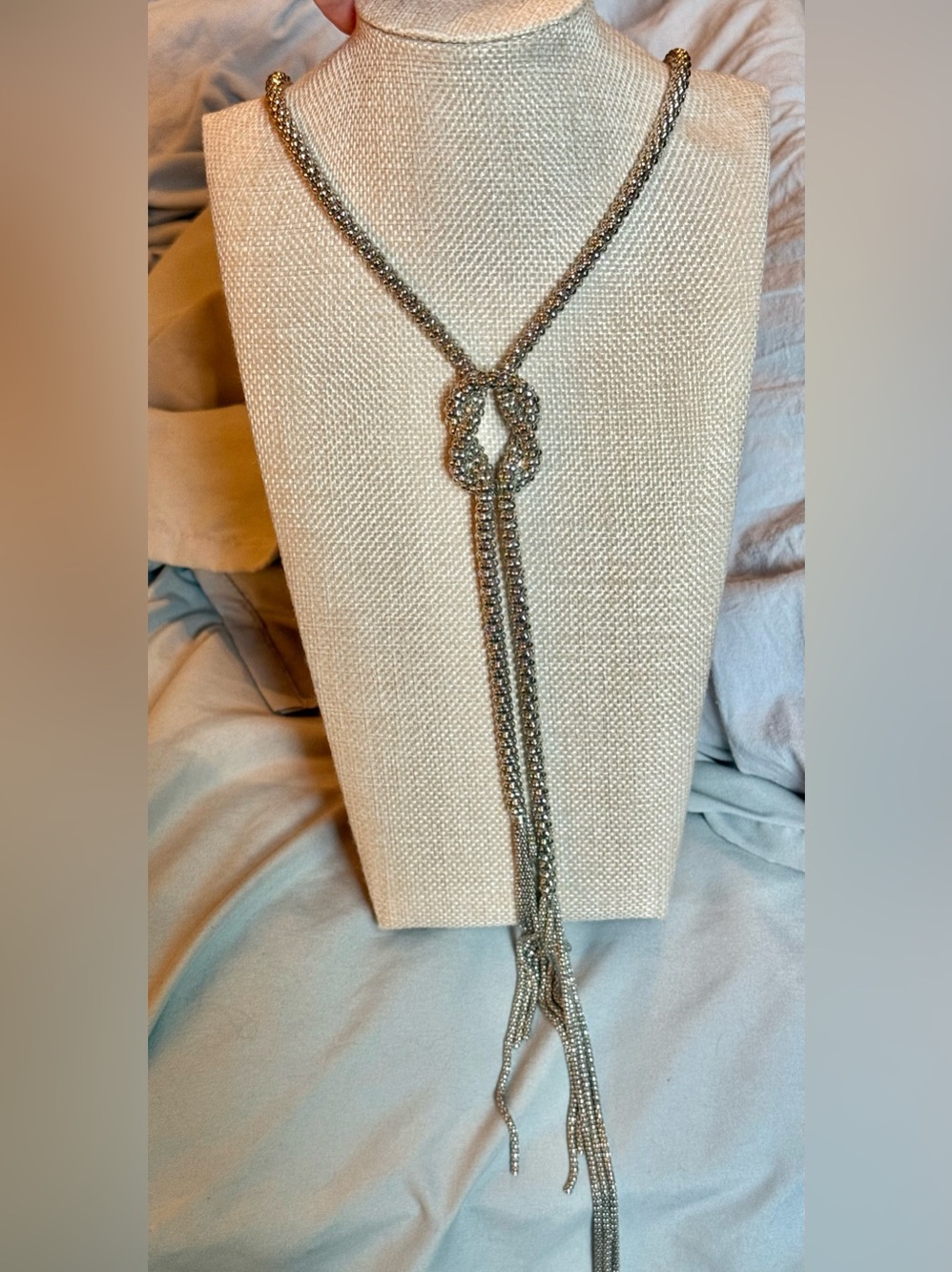 🦅NWOT! 26” Long Elegant Silver Knot Necklace with fringe at bottom.
